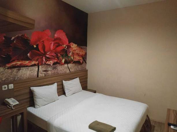 Imagen de la habitación del Hotel Vindhika Pengayoman. Foto 5