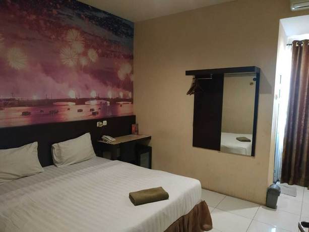 Imagen de la habitación del Hotel Vindhika Pengayoman. Foto 8