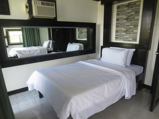 Imagen de la habitación del Hotel Vine Woods Resorts. Foto 18