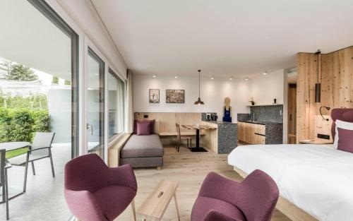 Imagen de la habitación del Hotel Vinea - Suites & Apartments. Foto 6