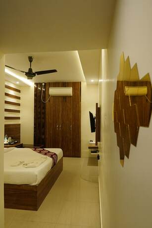 Imagen de la habitación del Hotel Vineet. Foto 19
