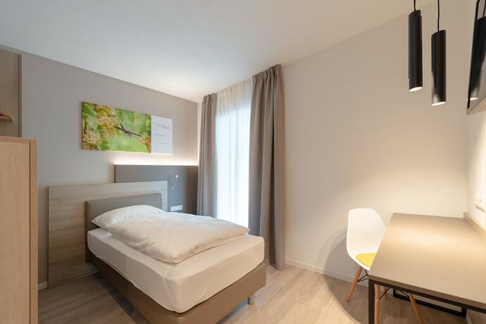 Imagen de la habitación del Hotel Vineus. Foto 12