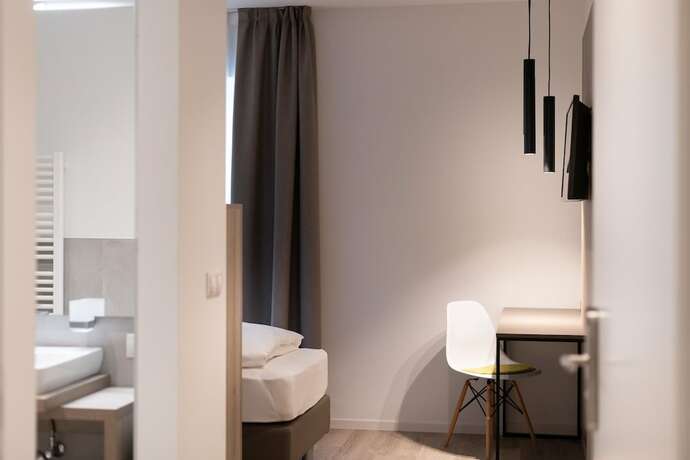 Imagen de la habitación del Hotel Vineus. Foto 19