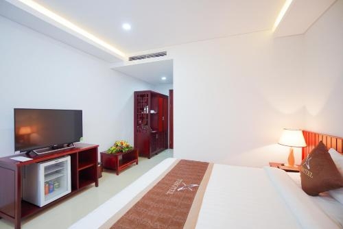 Imagen de la habitación del Hotel Vinh Hoang. Foto 6