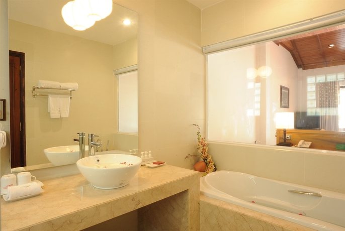Imagen de la habitación del Hotel Vinh Hung Riverside Resort and Spa. Foto 6