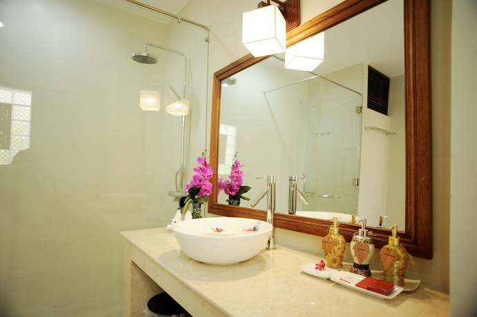 Imagen de la habitación del Hotel Vinh Hung Riverside Resort and Spa. Foto 7