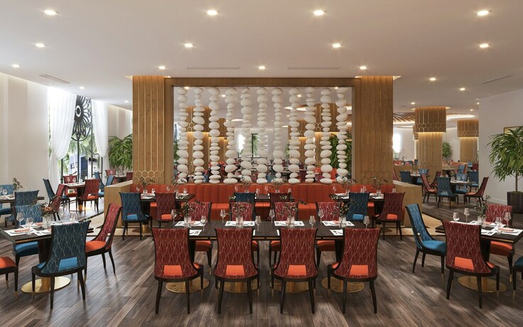 Imagen del bar/restaurante del Hotel Vinholidays Fiesta Phu Quoc. Foto 14