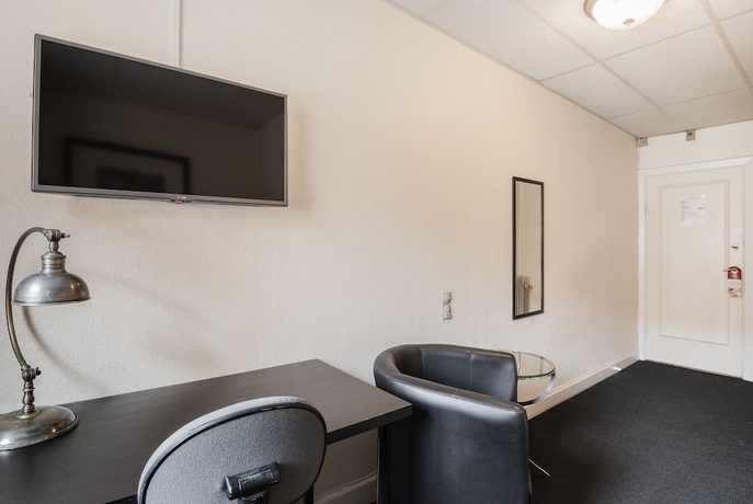 Imagen de la habitación del Hotel Vinhuset. Foto 4