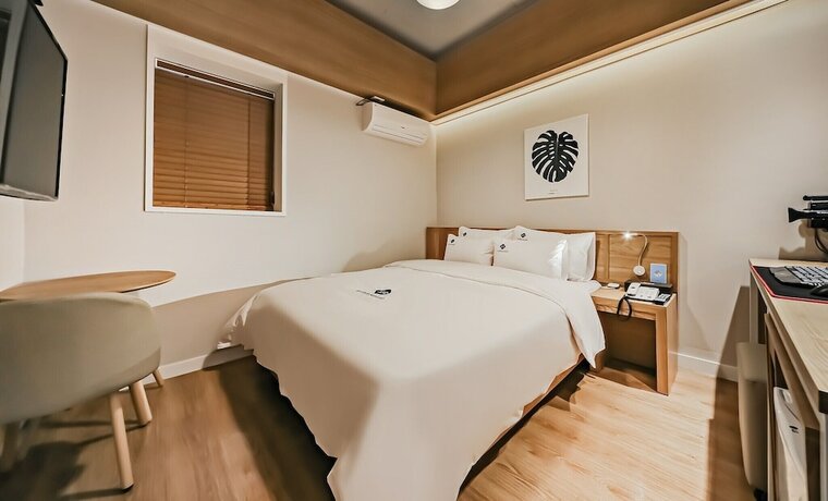 Imagen de la habitación del Hotel Vinn Haus. Foto 15