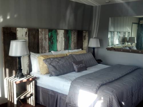 Imagen de la habitación del Hotel Vintage Block Inn and Suites. Foto 5