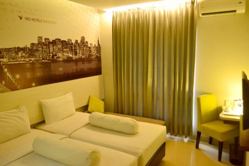 Imagen de la habitación del Hotel Vio Cihampelas. Foto 15