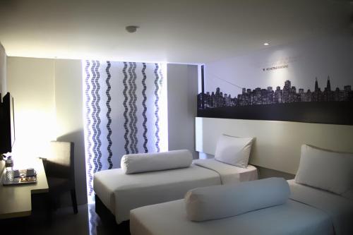 Imagen de la habitación del Hotel Vio Cihampelas. Foto 19