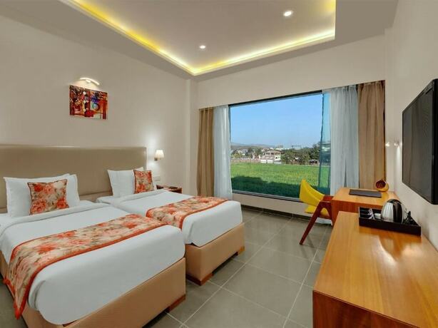 Imagen de la habitación del Hotel Viola Beacon Resort Lonavala. Foto 18