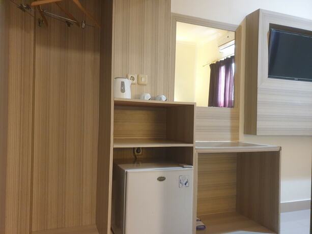 Imagen de la habitación del Hotel Violand Garden Samarinda. Foto 13