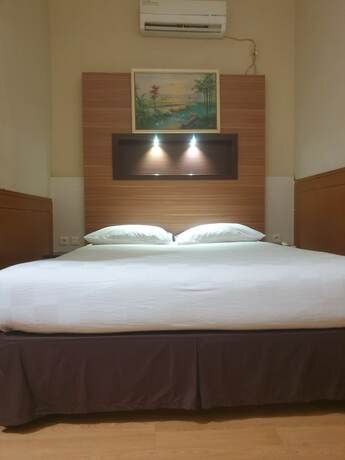 Imagen de la habitación del Hotel Violand Garden Samarinda. Foto 14