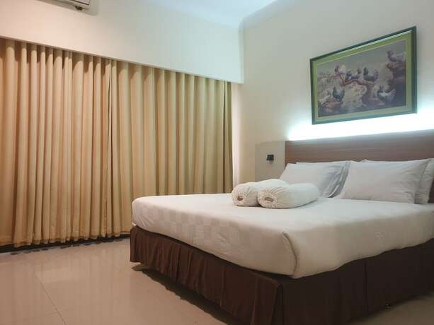 Imagen de la habitación del Hotel Violand Garden Samarinda. Foto 15
