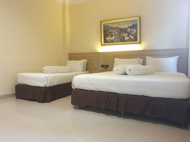 Imagen de la habitación del Hotel Violand Garden Samarinda. Foto 16