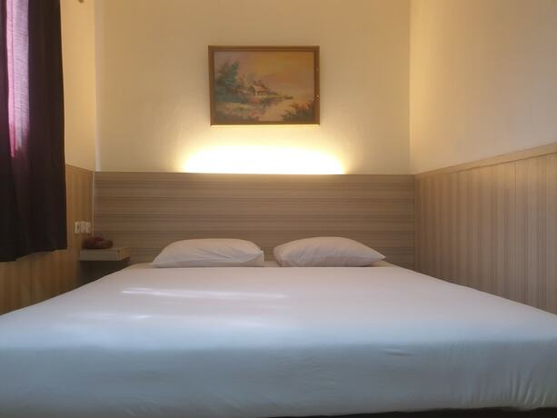 Imagen de la habitación del Hotel Violand Garden Samarinda. Foto 18