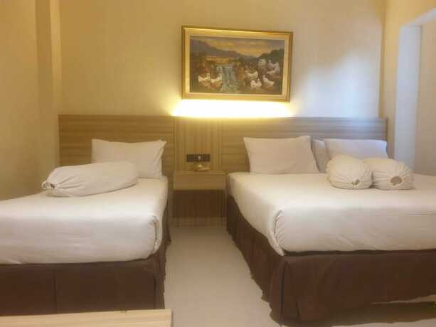 Imagen de la habitación del Hotel Violand Garden Samarinda. Foto 19