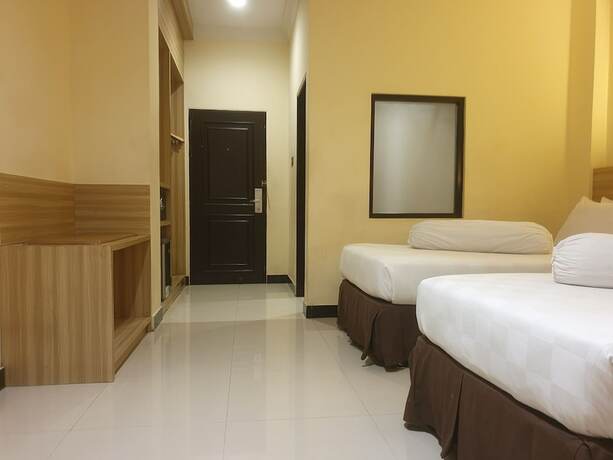 Imagen de la habitación del Hotel Violand Garden Samarinda. Foto 20
