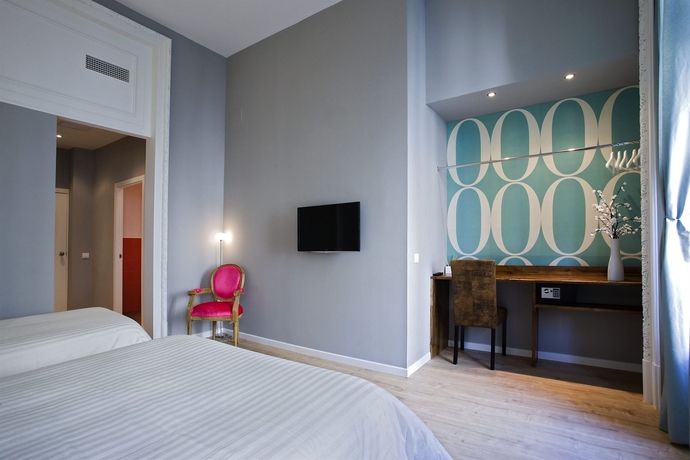 Imagen de la habitación del Hotel Violeta Boutique. Foto 13