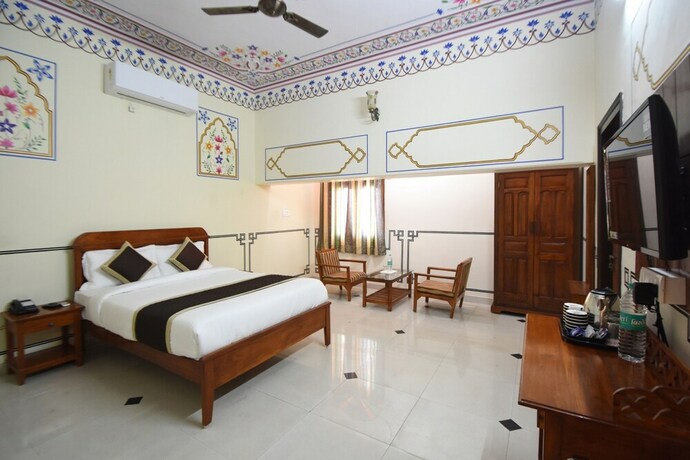 Imagen de la habitación del Hotel Virasat Mahal Heritage. Foto 18