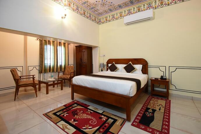 Imagen de la habitación del Hotel Virasat Mahal Heritage. Foto 23