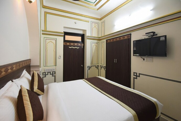 Imagen de la habitación del Hotel Virasat Mahal Heritage. Foto 24