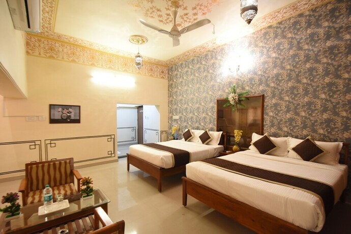 Imagen de la habitación del Hotel Virasat Mahal Heritage. Foto 25