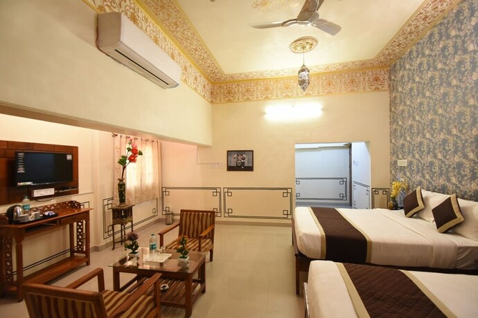 Imagen de la habitación del Hotel Virasat Mahal Heritage. Foto 26