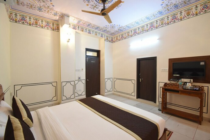 Imagen de la habitación del Hotel Virasat Mahal Heritage. Foto 28