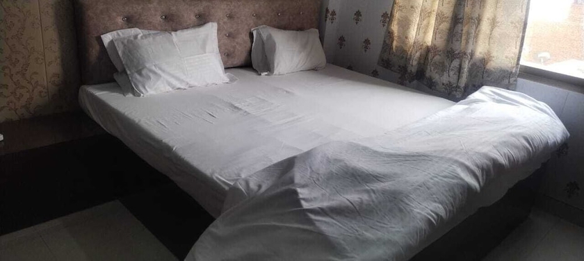 Imagen de la habitación del Hotel Virendra Palace Guest House. Foto 8
