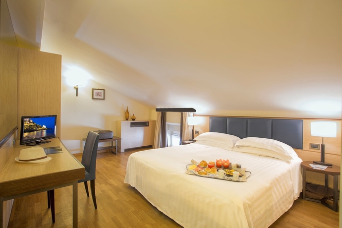 Imagen de la habitación del Hotel Virgilio Grand. Foto 3