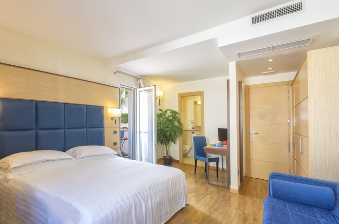 Imagen de la habitación del Hotel Virgilio Grand. Foto 7