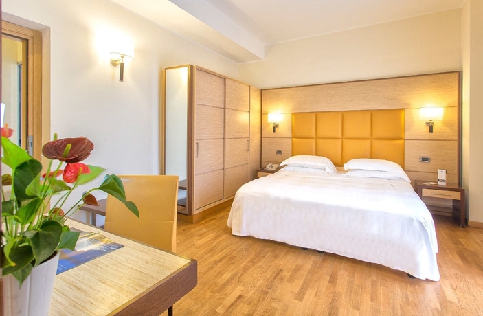 Imagen de la habitación del Hotel Virgilio Grand. Foto 9