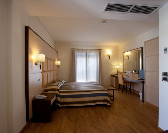 Imagen de la habitación del Hotel Virgilio Grand. Foto 11