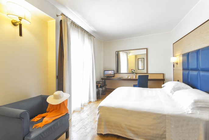 Imagen de la habitación del Hotel Virgilio Grand. Foto 14