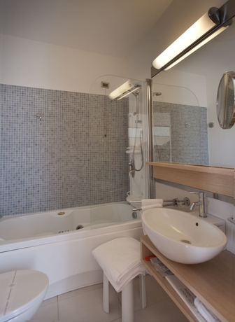 Imagen de la habitación del Hotel Virgilio Grand. Foto 17