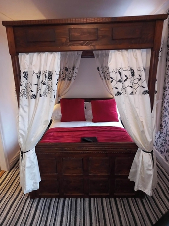 Imagen de la habitación del Hotel Virginia Cottage. Foto 3