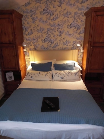 Imagen de la habitación del Hotel Virginia Cottage. Foto 4