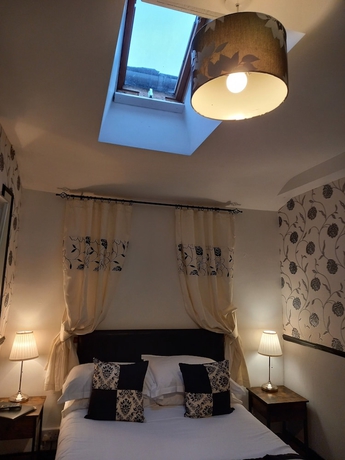 Imagen de la habitación del Hotel Virginia Cottage. Foto 5