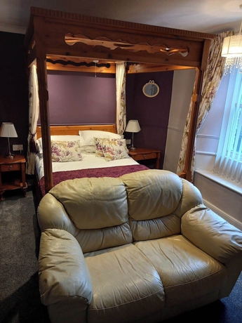 Imagen de la habitación del Hotel Virginia Cottage. Foto 7