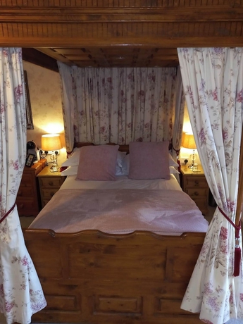 Imagen de la habitación del Hotel Virginia Cottage. Foto 8