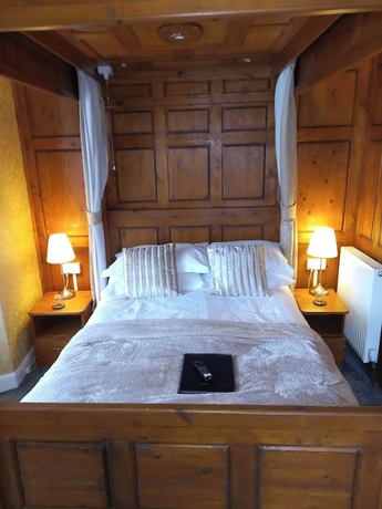 Imagen de la habitación del Hotel Virginia Cottage. Foto 9