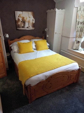 Imagen de la habitación del Hotel Virginia Cottage. Foto 15
