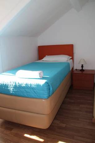 Imagen de la habitación del Hotel Viriato Rooms. Foto 11