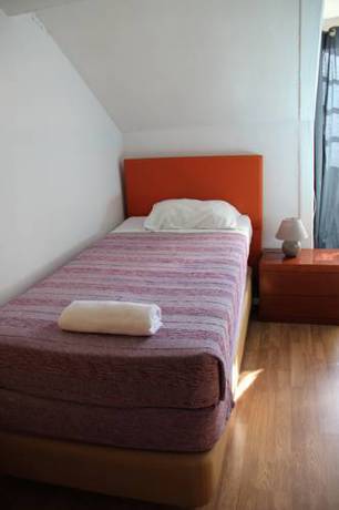 Imagen de la habitación del Hotel Viriato Rooms. Foto 12