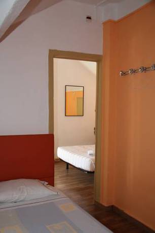 Imagen de la habitación del Hotel Viriato Rooms. Foto 15