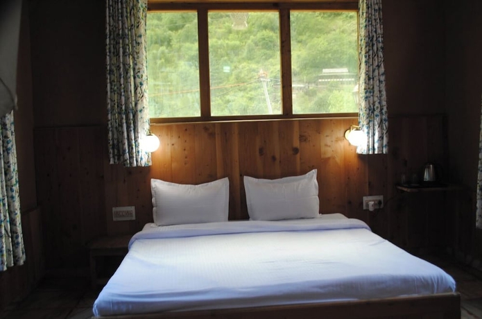 Imagen de la habitación del Hotel Virman Hillside Resort. Foto 11