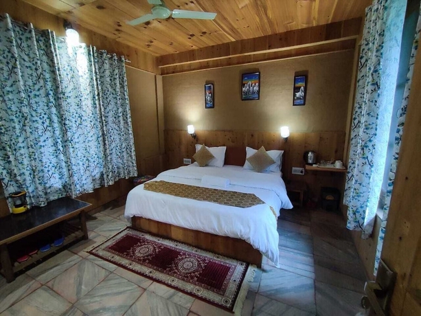 Imagen de la habitación del Hotel Virman Hillside Resort. Foto 12